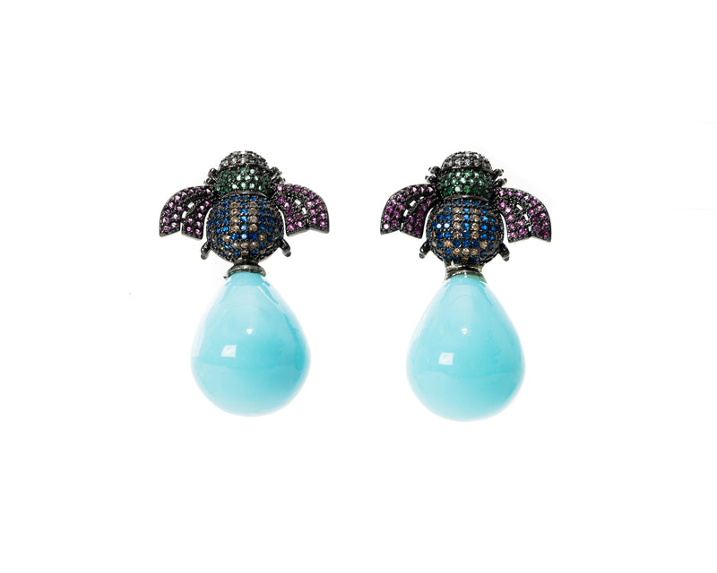 18K gold plated earrings with a bee atop a white pearl or hand enameled drop in either coral or turquoise. 
