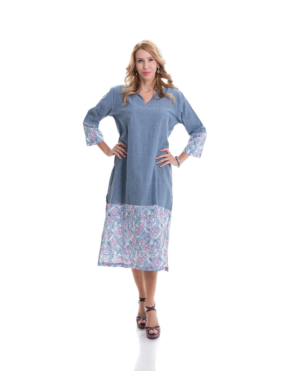 The image shows the Yatra Hope Kaftan Dress. The material is 100% chambray cotton with floral block printed detail at the sleeves and the boson half of the kaftan. 