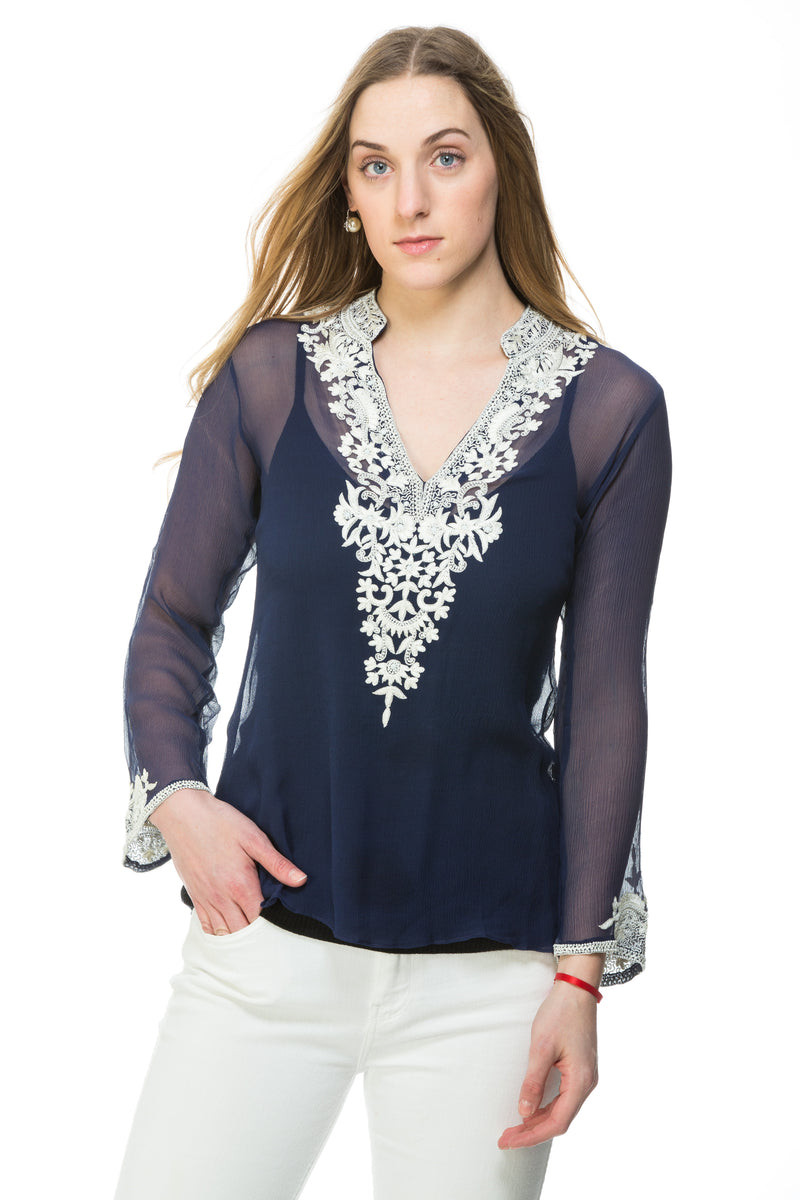 Silk chiffon tunic available in navy with white silk thread and bead embroidery and nude with black silk thread and bead embroidery. Embroidery detail around the neck and sleeves of the tunic. This is a sheer tunic. 