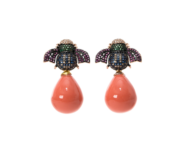 18K gold plated earrings with a bee atop a white pearl or hand enameled drop in either coral or turquoise. 