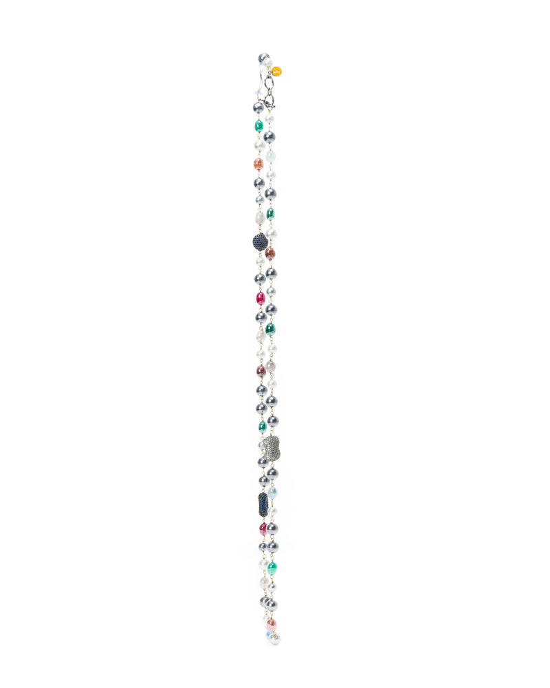 The Joon Necklace is a single string of pearls and semi-precious stones in a variety of hues. 