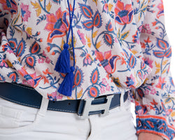 Floral block printed soft cotton full sleeve top with a navy tassel detail .