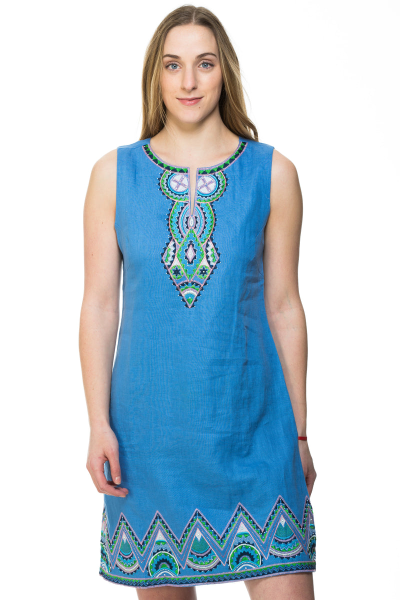 Sleeveless white or blue linen dress with multi colored embroidery along the neck and bottom of the dress. 