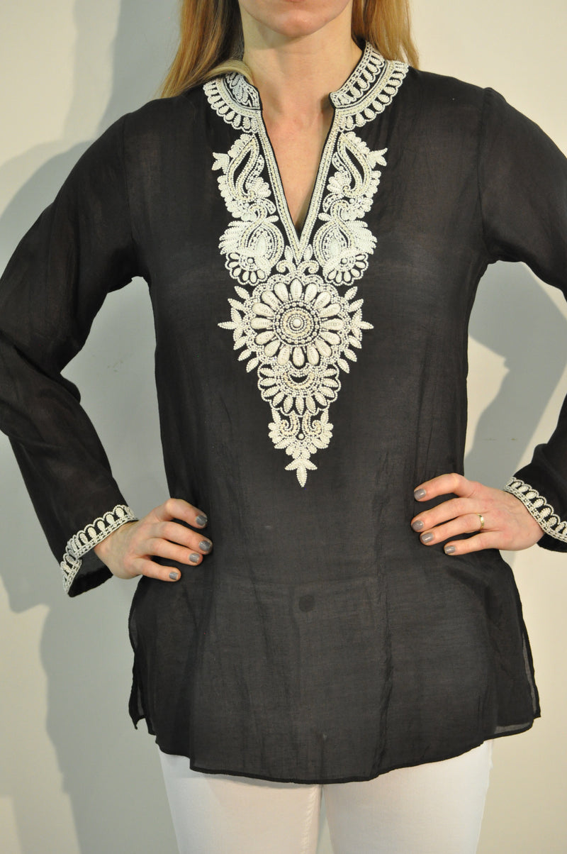 Black cotton silk tunic with extensive white beading and embroidery around the neck, sleeves and back of the tunic. 