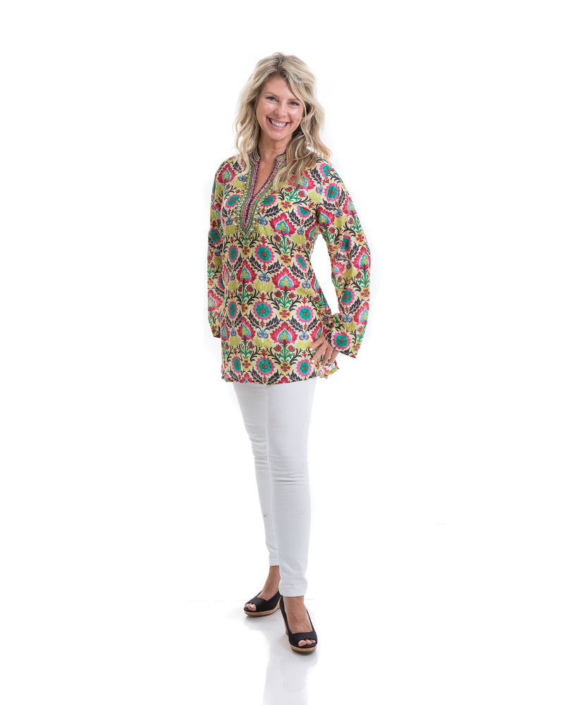 A printed cotton silk tunic with extensive gold embroidery around the neck and back make this a special piece. The print is vibrant and this tunic can be worn all year round. 