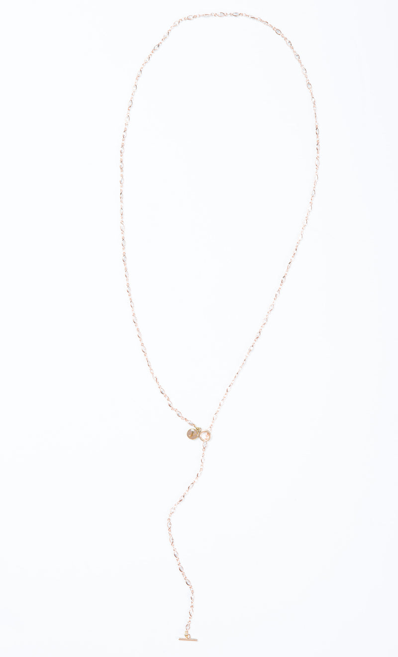 Delicate necklace with marquise shaped  Swarovski crystals. Length of necklace is 38". This necklace can be worn long or doubled.  