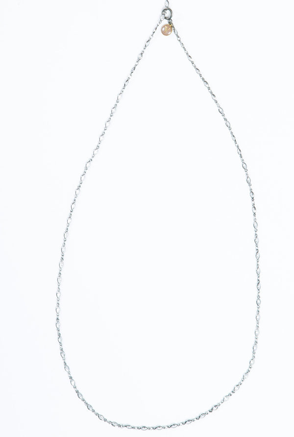Delicate necklace with marquise shaped  Swarovski crystals. Length of necklace is 38". This necklace can be worn long or doubled.  