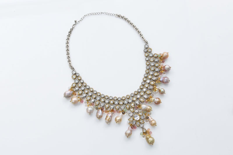 The Jaipur necklace is a take on the traditional uncut diamond necklace. The crystals and pearls are reminiscent of royal Indian jewelry also refereed to as jadua jewelry. 