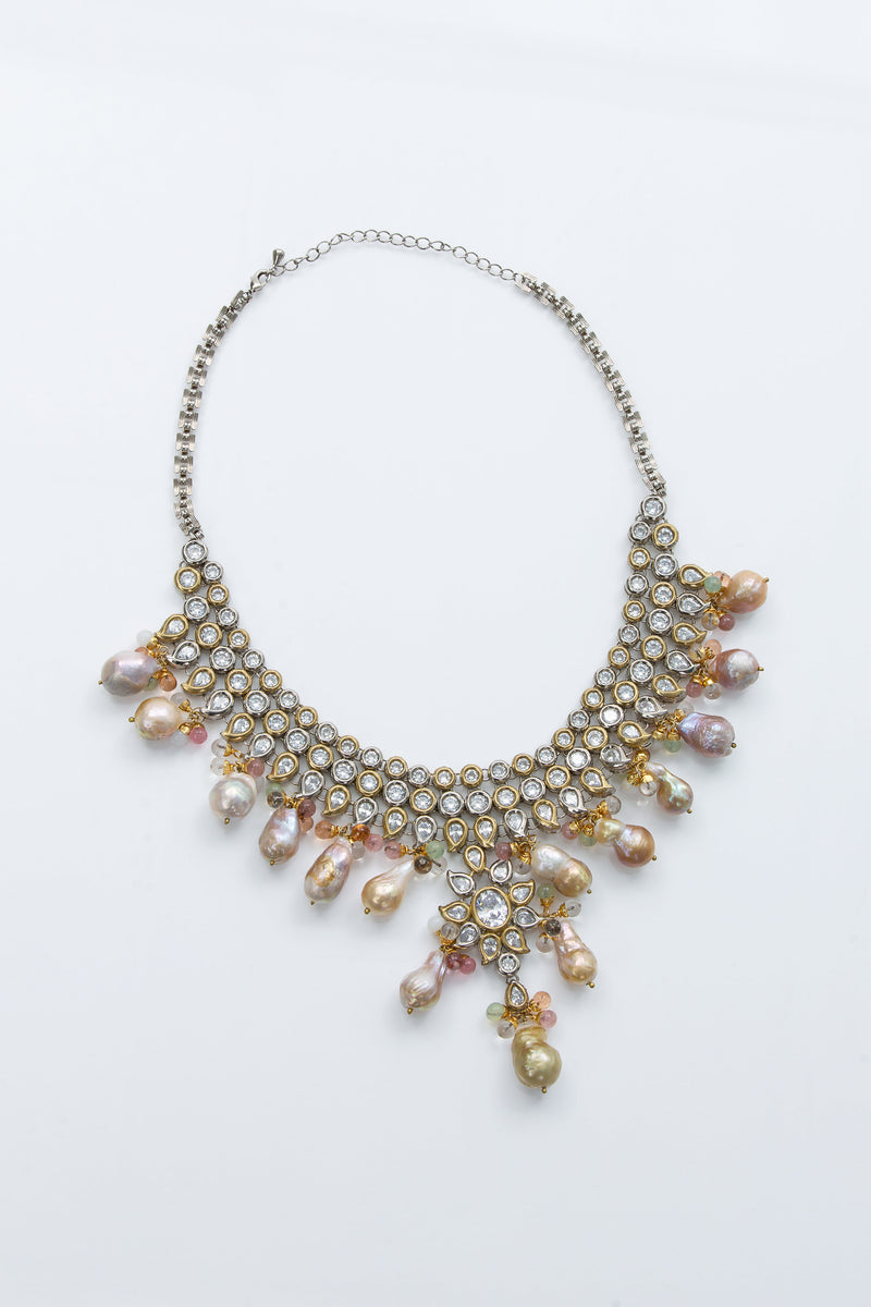 The Jaipur necklace is a take on the traditional uncut diamond necklace. The crystals and pearls are reminiscent of royal Indian jewelry also refereed to as jadua jewelry. 