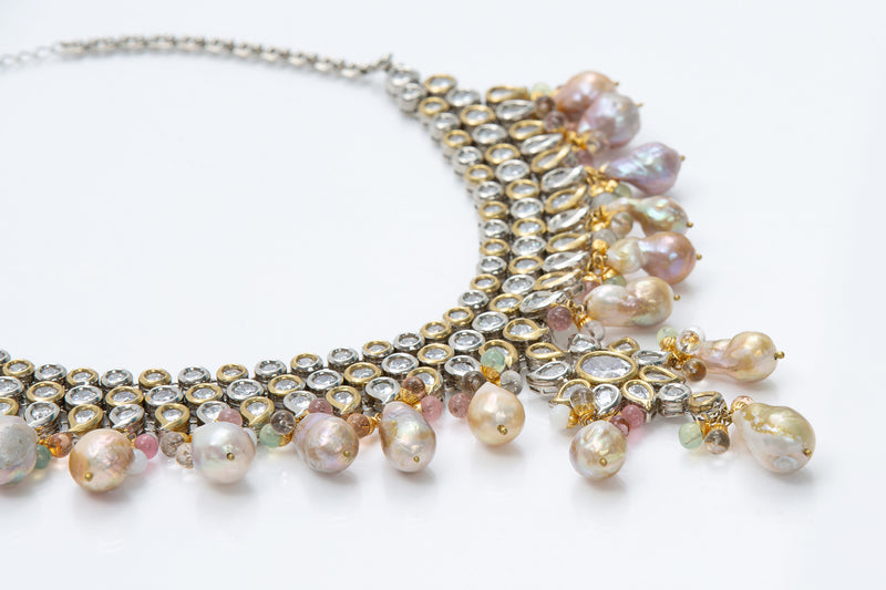 The Jaipur necklace is a take on the traditional uncut diamond necklace. The crystals and pearls are reminiscent of royal Indian jewelry also refereed to as jadua jewelry. 