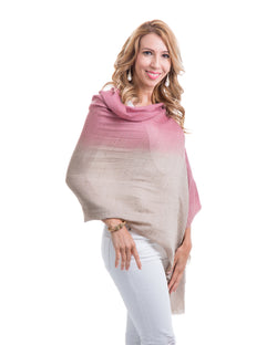 This image showcases our Felicity shawl. This is a cashmere shawl with an ombre effect ranging from pink to wheat. The shawl is decorated with gold and silver swarovski crystals on the entire shawl. The shawl is 81” X 29”.