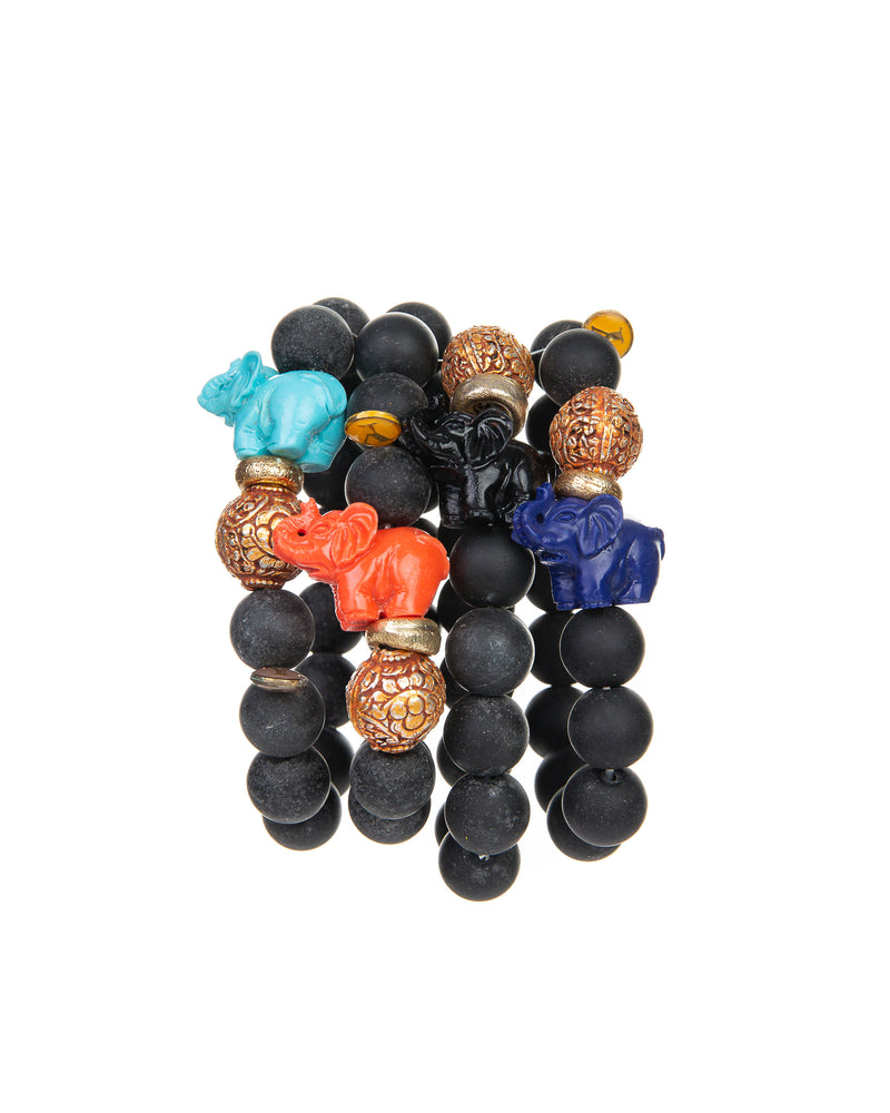 The JOY Bracelets are a must have for all Elephant enthusiasts. Its organic silhouette is crafted by hand. It is hand-strung lava stone bead after bead with flowing fluidity as an easy to wear stretch bracelet to create a sinuous, harmonious whole.  It is the ideal accessory and thanks to its stretchy nature the bracelet is easy to put on and take off. It’s all round stones with the organic natural stone ridges connect you to the earth.