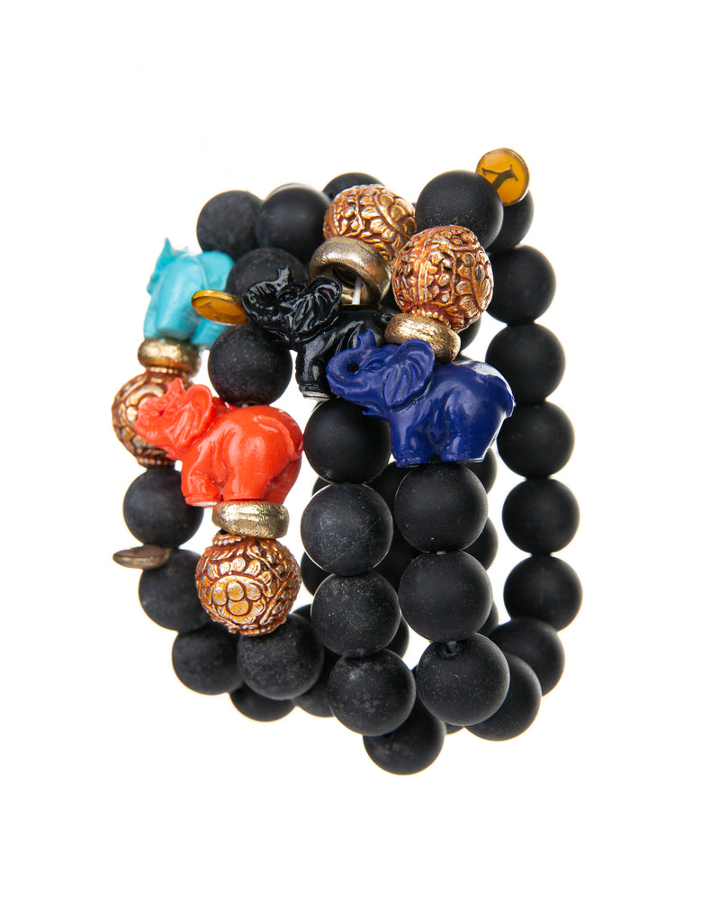 The JOY Bracelets are a must have for all Elephant enthusiasts. Its organic silhouette is crafted by hand. It is hand-strung lava stone bead after bead with flowing fluidity as an easy to wear stretch bracelet to create a sinuous, harmonious whole.  It is the ideal accessory and thanks to its stretchy nature the bracelet is easy to put on and take off. It’s all round stones with the organic natural stone ridges connect you to the earth.