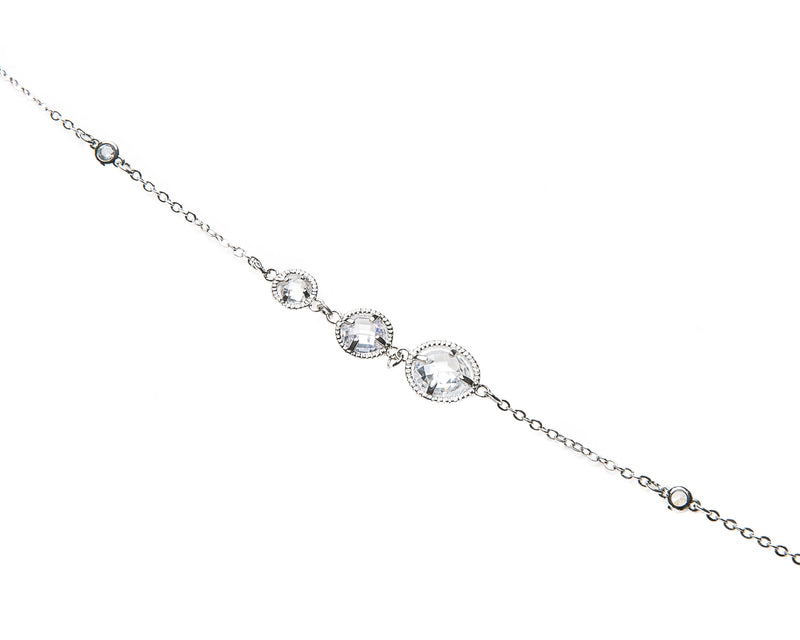 Delicate necklace with varied sizes of Swarovski crystals. Length of necklace is 40". This necklace can be worn long or doubled. The toggle clasp makes it easier to wear and take off. 