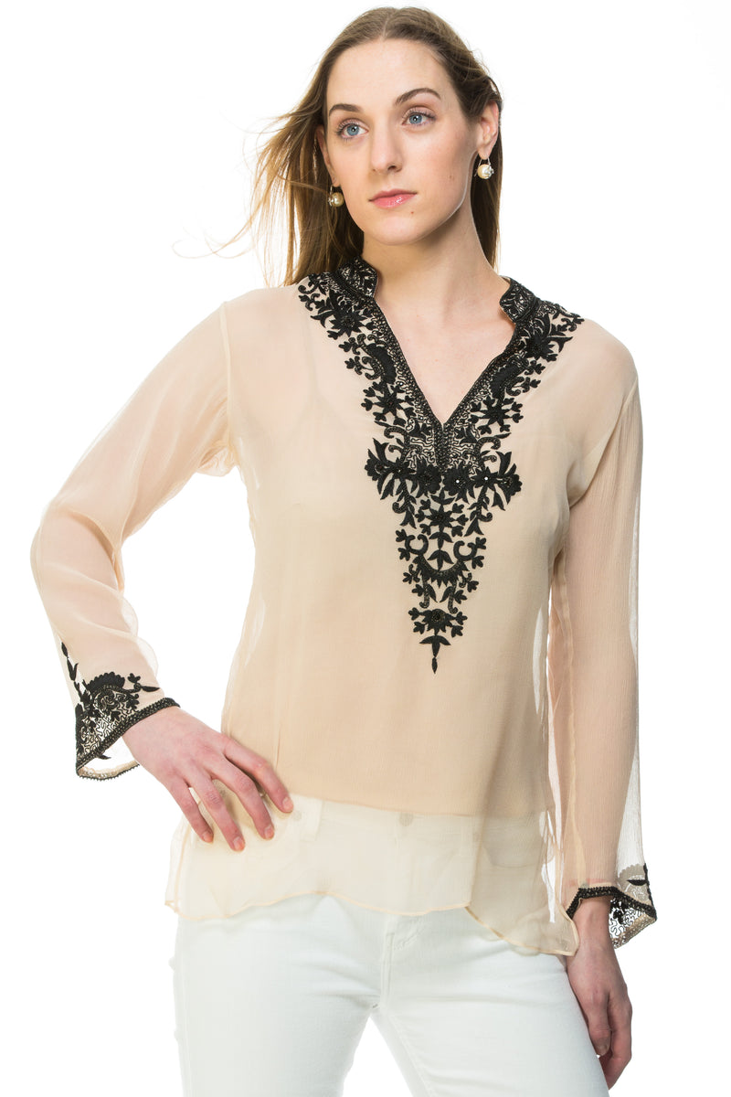 Silk chiffon tunic available in navy with white silk thread and bead embroidery and nude with black silk thread and bead embroidery. Embroidery detail around the neck and sleeves of the tunic. This is a sheer tunic. 