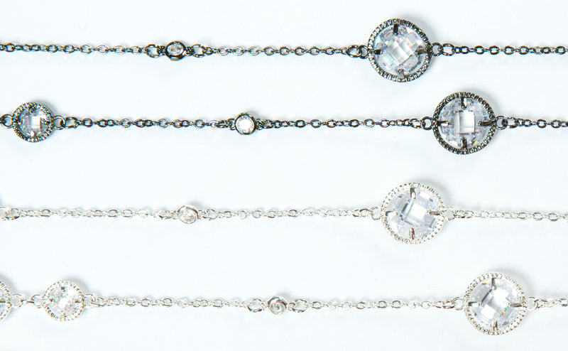 Delicate necklace with varied sizes of Swarovski crystals. Length of necklace is 40". This necklace can be worn long or doubled. The toggle clasp makes it easier to wear and take off. 